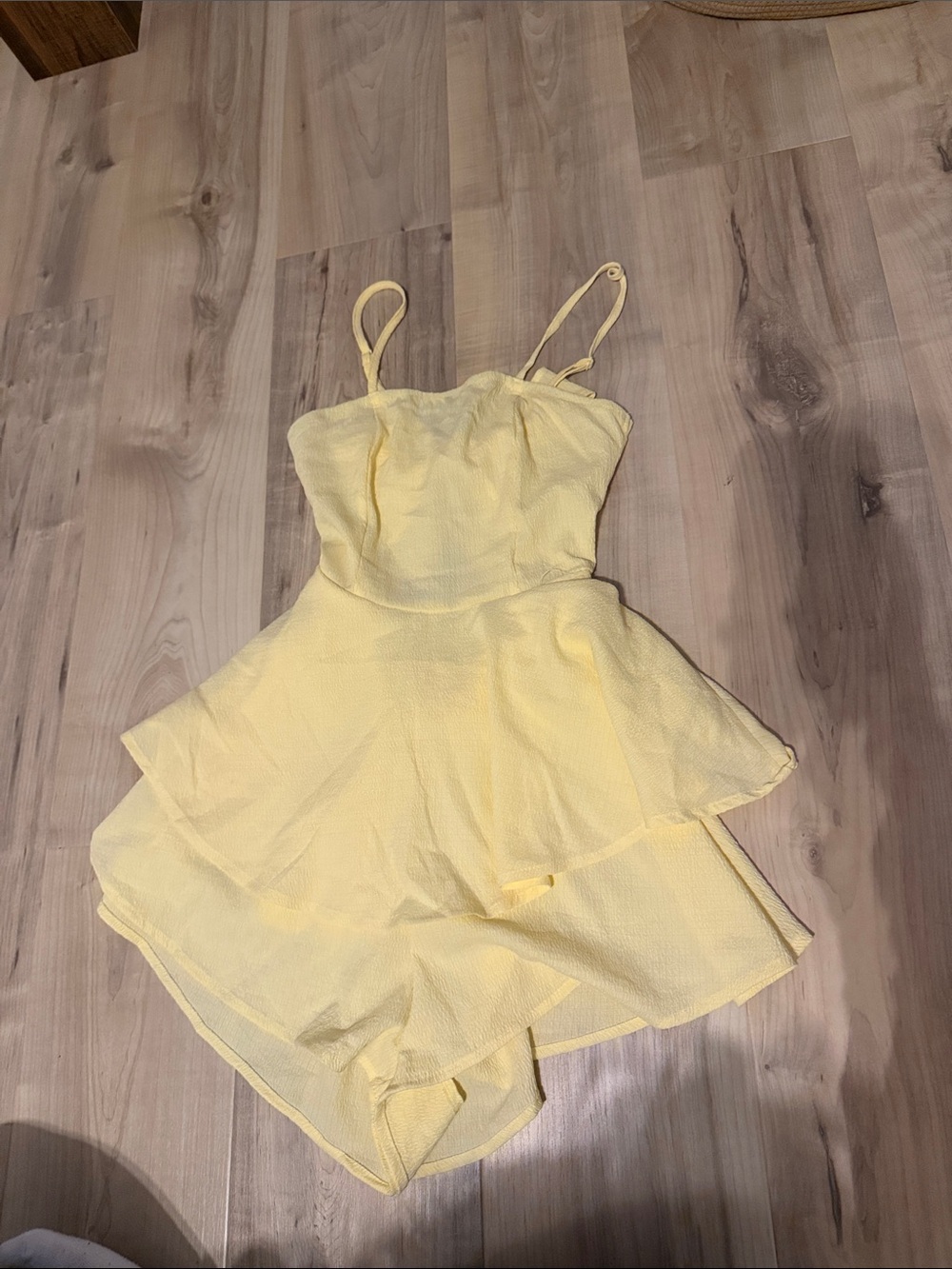 size xs yellow double lined shein flowy romper with ruffles